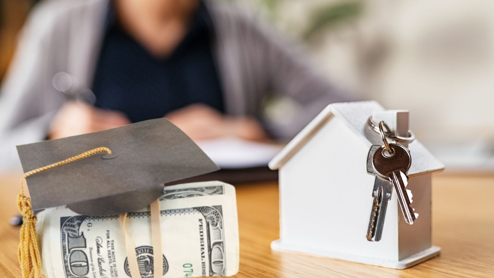 Can I Buy A House if I Have School Loans? 